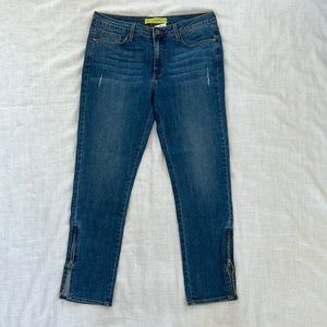 William B size 29 medium wash zipper slit slim straight leg jean.  New with tag